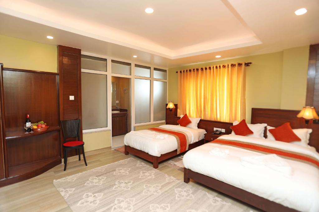 Ένα ή περισσότερα κρεβάτια σε δωμάτιο στο Hotel The Clock