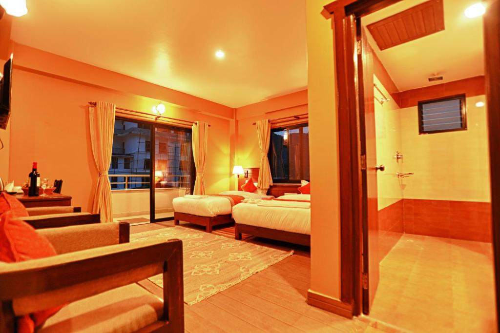Ένα ή περισσότερα κρεβάτια σε δωμάτιο στο Hotel The Clock
