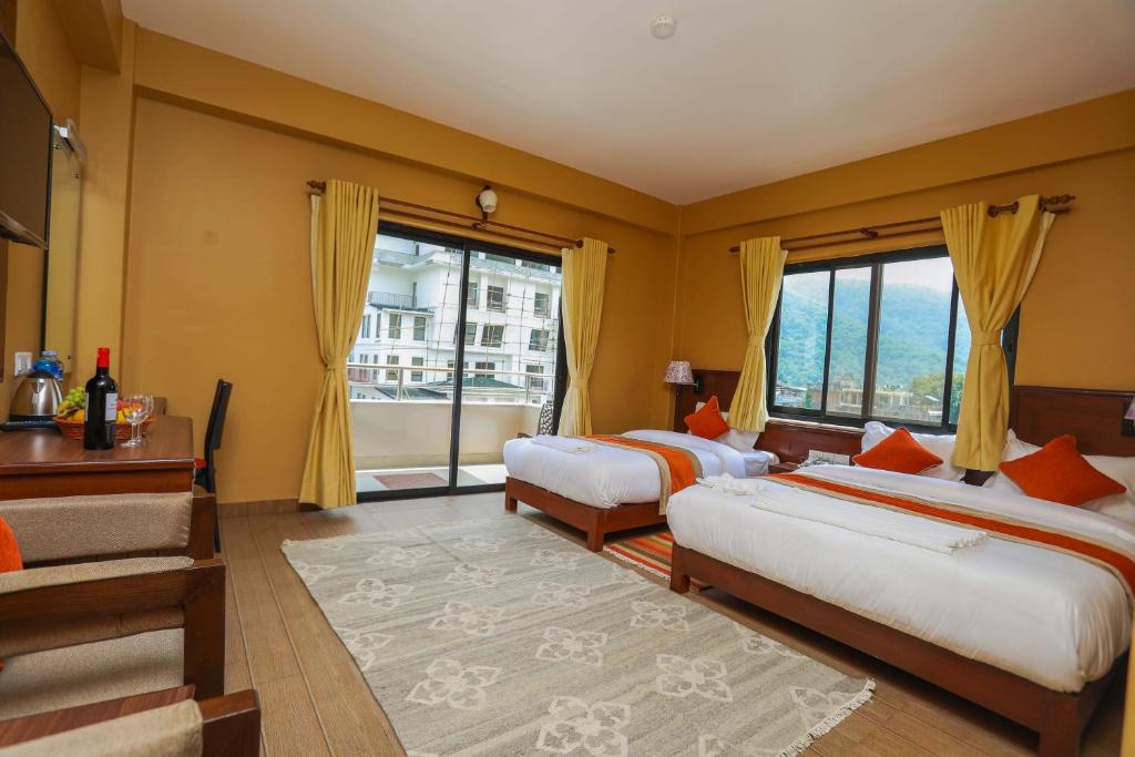 Ένα ή περισσότερα κρεβάτια σε δωμάτιο στο Hotel The Clock