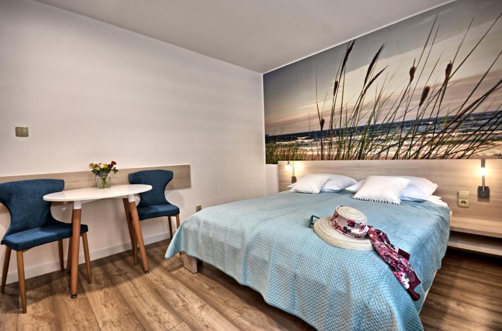 Postel nebo postele na pokoji v ubytování Akoja