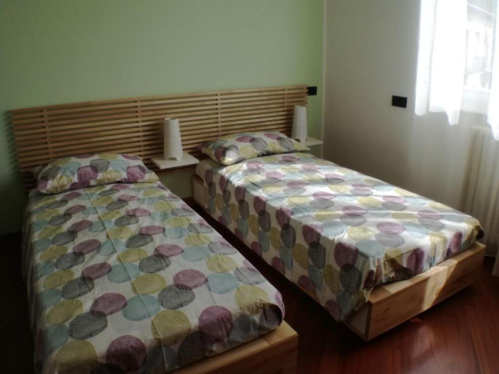 Postel nebo postele na pokoji v ubytování B&B SARI