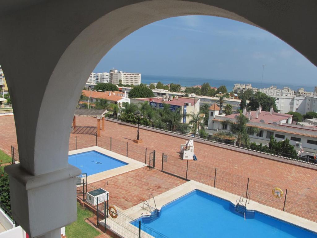 Výhled na bazén z ubytování Tres Carabelas nebo okolí