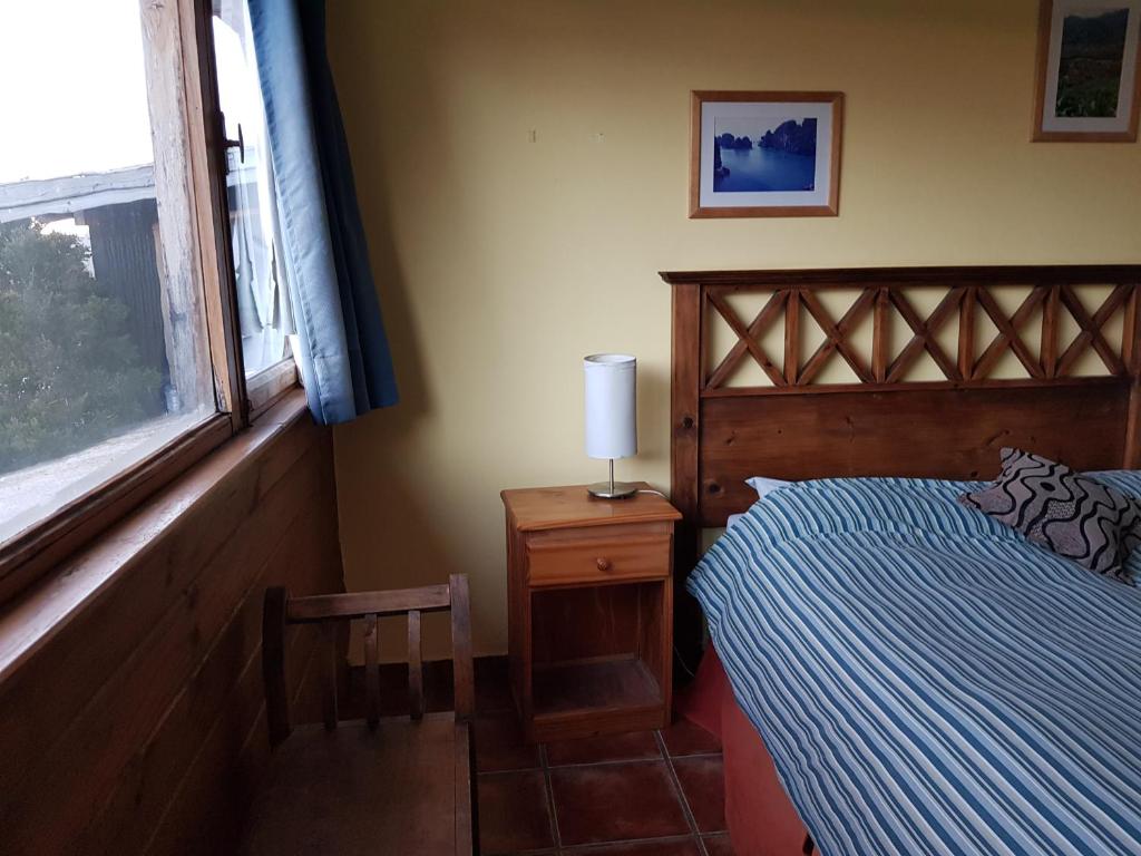 Postel nebo postele na pokoji v ubytování Patagonia Jazz Hostel
