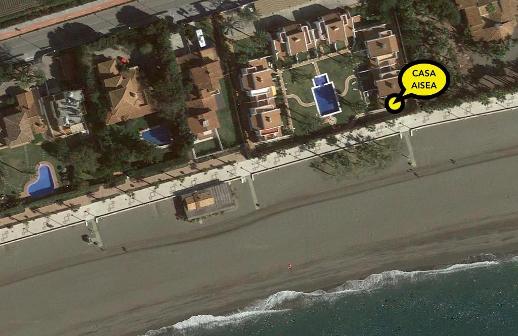 an aerial view of a resort with a yellow sign at Casa Haisea 2 in Caleta De Velez