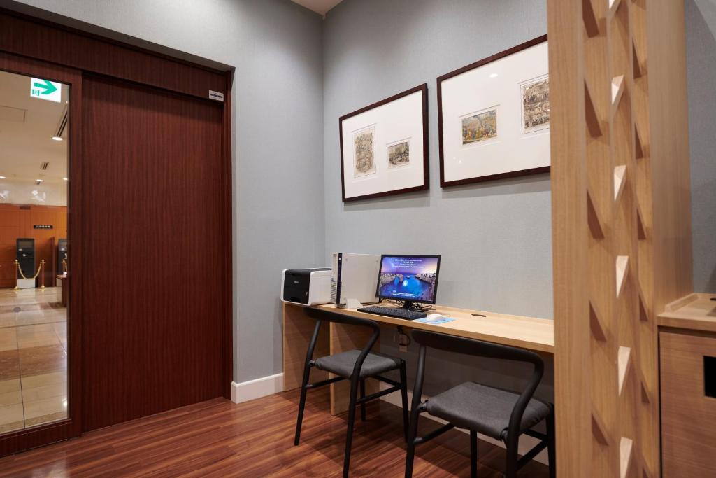 TV a/nebo společenská místnost v ubytování HOTEL VISCHIO AMAGASAKI by GRANVIA