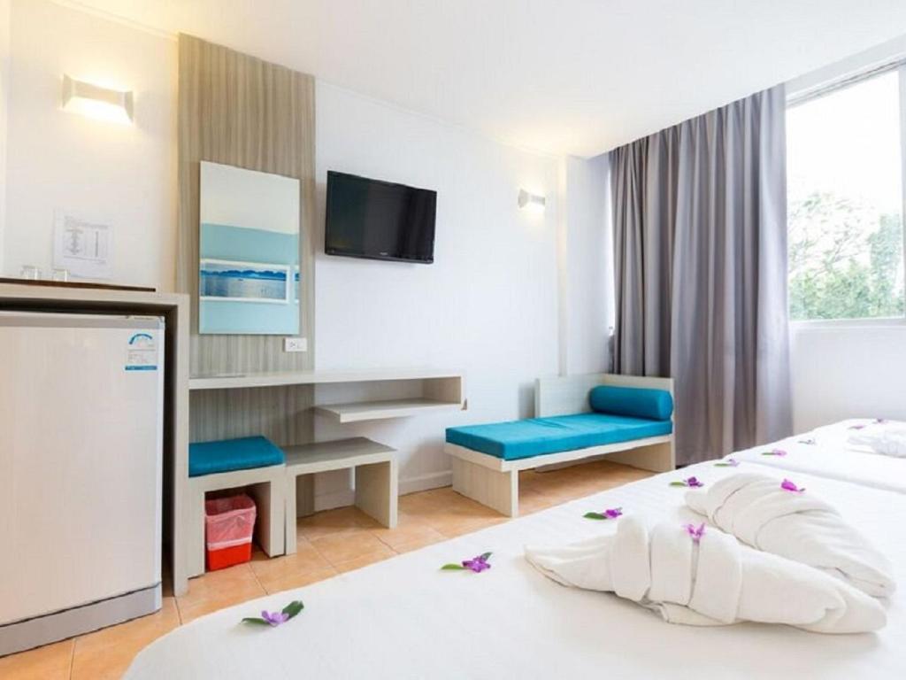 Postel nebo postele na pokoji v ubytování ON Hotel Phuket - SHA