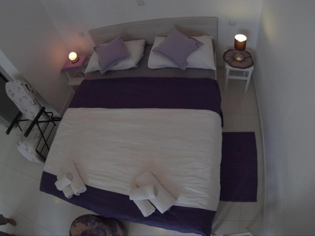 Posteľ alebo postele v izbe v ubytovaní Apartment Lavanda Ruzmarin