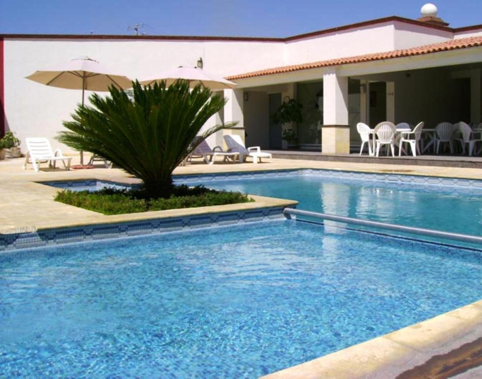 Bazén v ubytování San Juan Park Hotel nebo v jeho okolí
