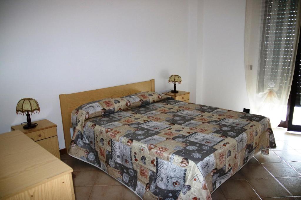 A bed or beds in a room at Edificio Cannizzo