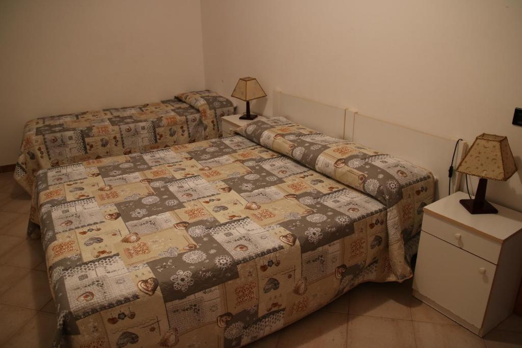 A bed or beds in a room at Edificio Cannizzo