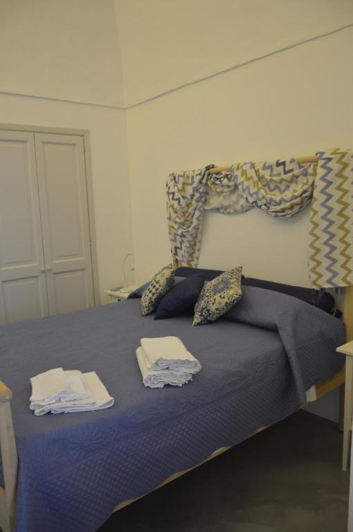 Postel nebo postele na pokoji v ubytování kammamia