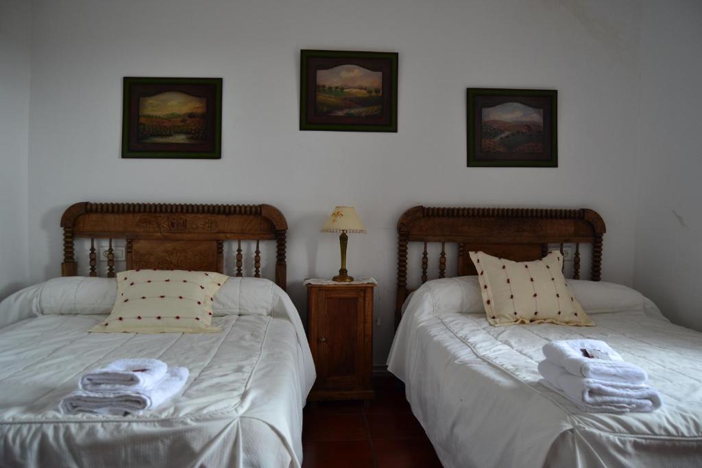 A bed or beds in a room at Amanecer en Campos