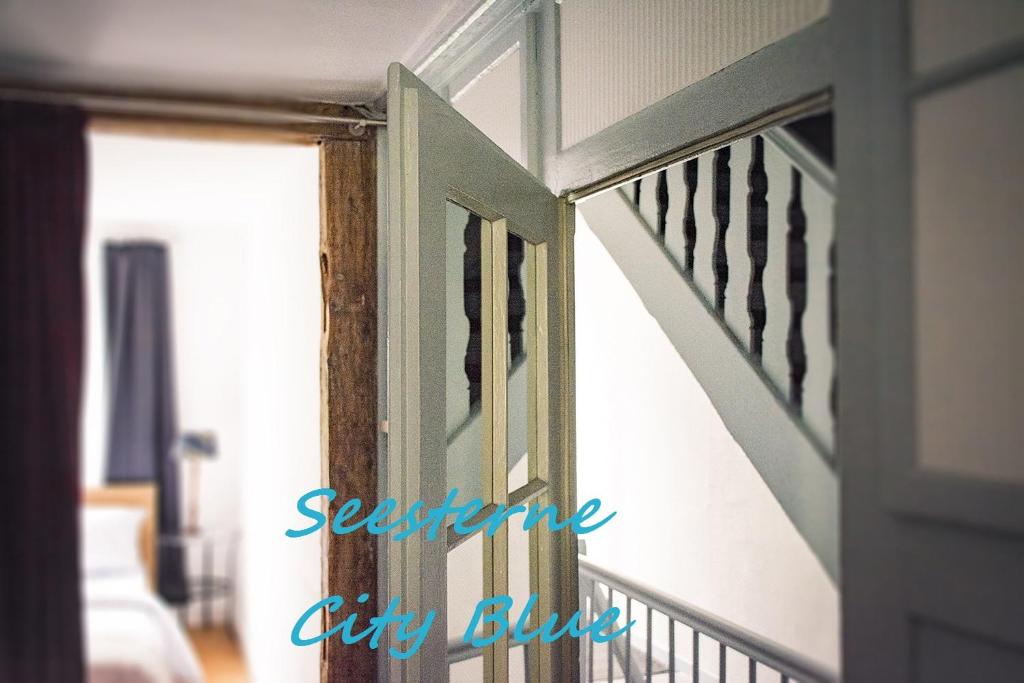 a sliding glass door on a stair case at Seesterne City in Konstanz