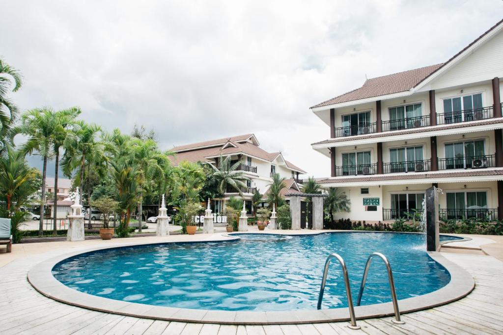 Bazén v ubytování Diamond Park Inn Chiangrai & Resort nebo v jeho okolí