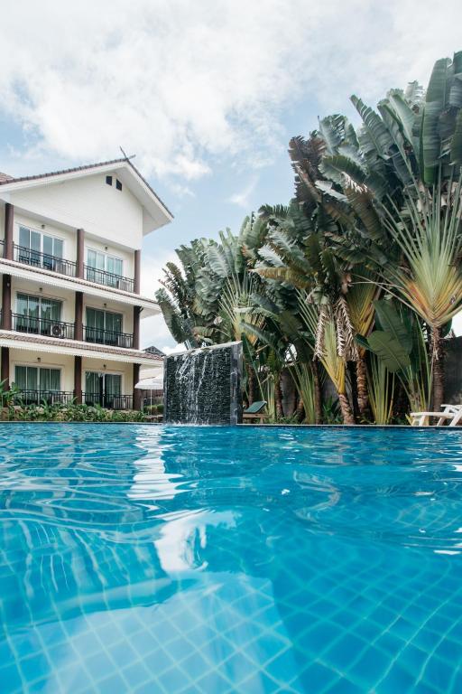 Bazén v ubytování Diamond Park Inn Chiangrai & Resort nebo v jeho okolí