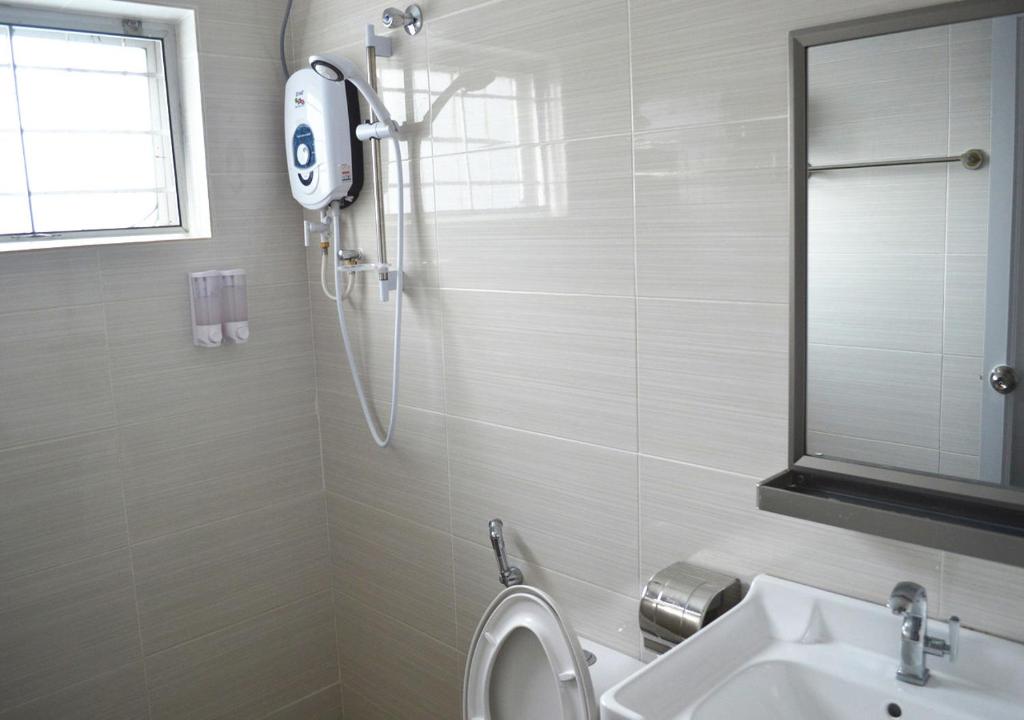 Koupelna v ubytování Angsoka Hotel