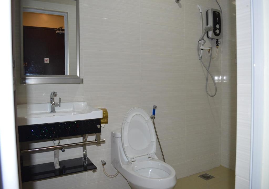 Koupelna v ubytování Angsoka Hotel