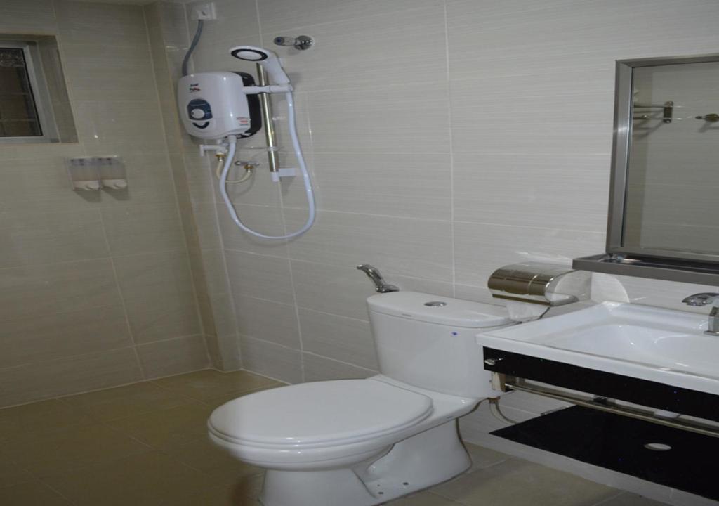 Koupelna v ubytování Angsoka Hotel