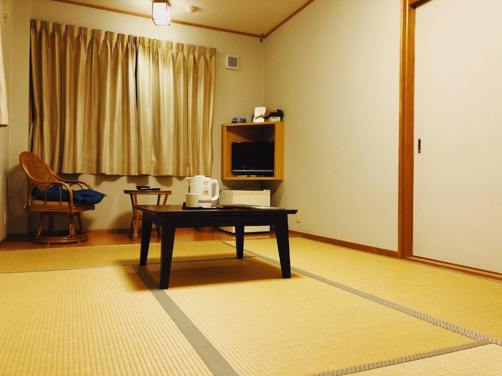 Posezení v ubytování まなべ旅館