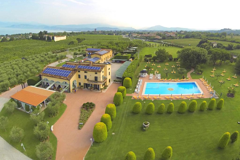 an aerial view of a estate with a swimming pool at Agriturismo Ca' Del Sol in Lazise