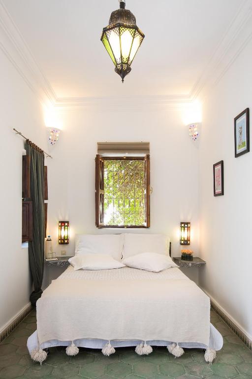 Postel nebo postele na pokoji v ubytování Riad Villa Harmonie