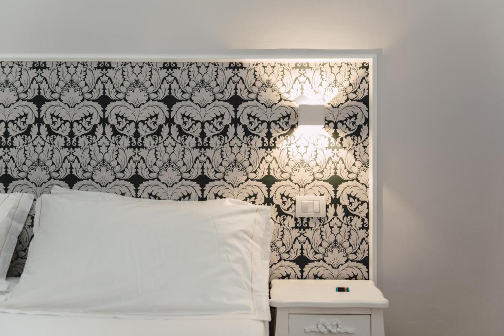 Posteľ alebo postele v izbe v ubytovaní Elysium B&B