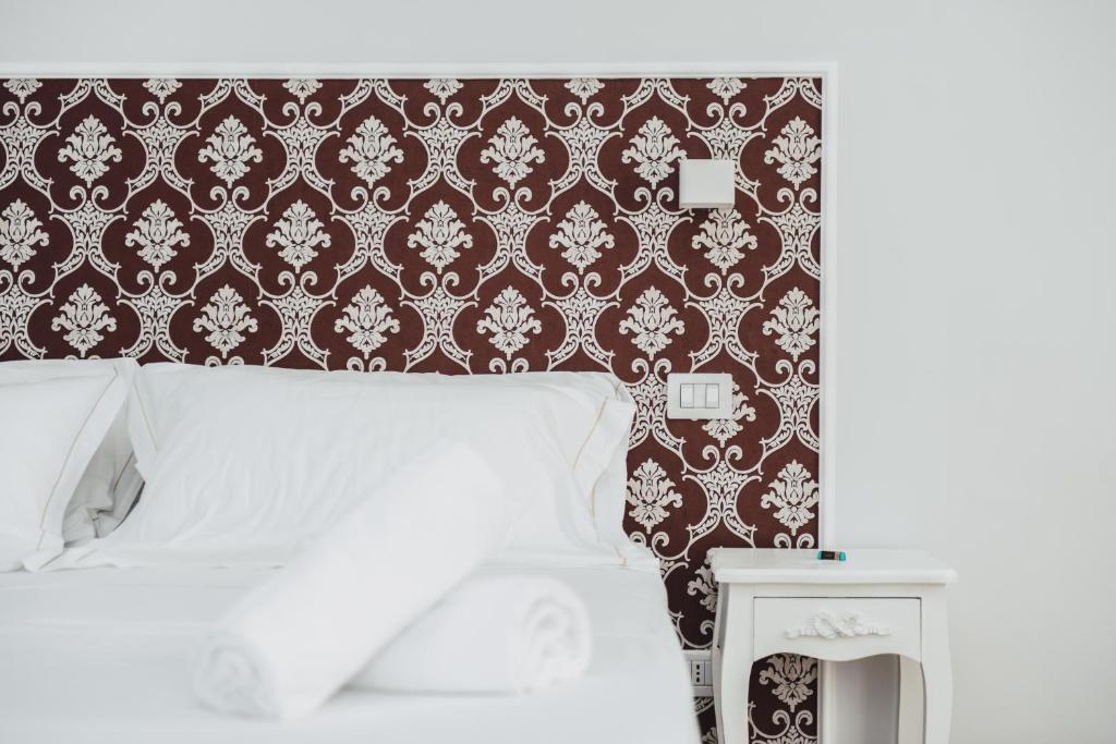 Posteľ alebo postele v izbe v ubytovaní Elysium B&B
