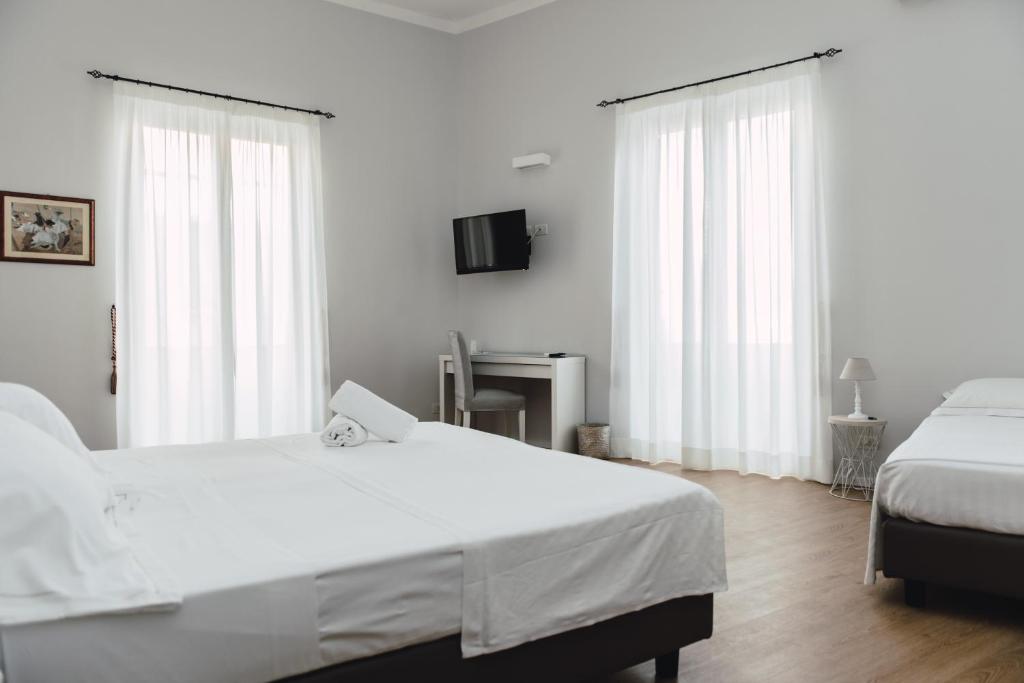 Posteľ alebo postele v izbe v ubytovaní Elysium B&B