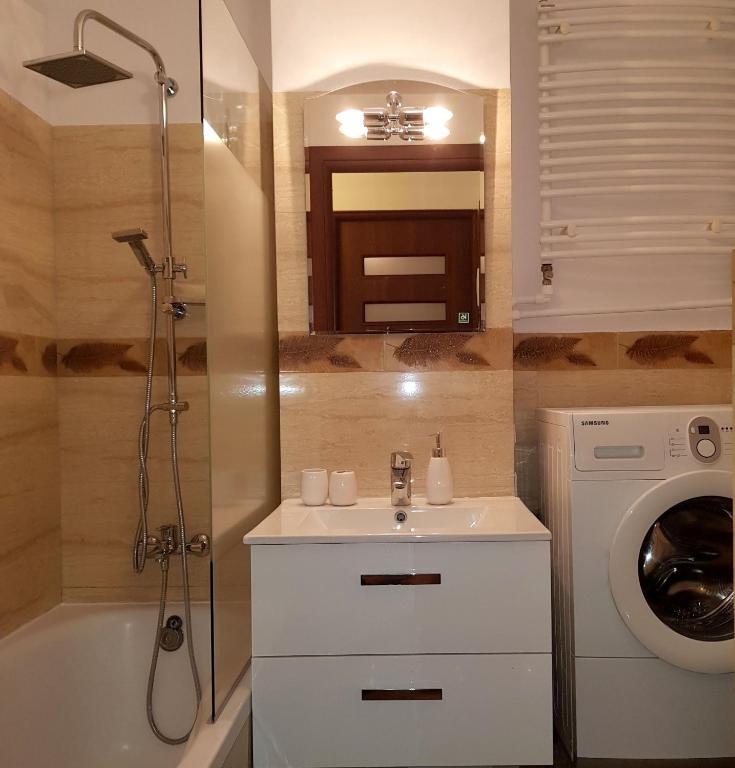 Kúpeľňa v ubytovaní DELUXE WIDOK 24 APARTMENT