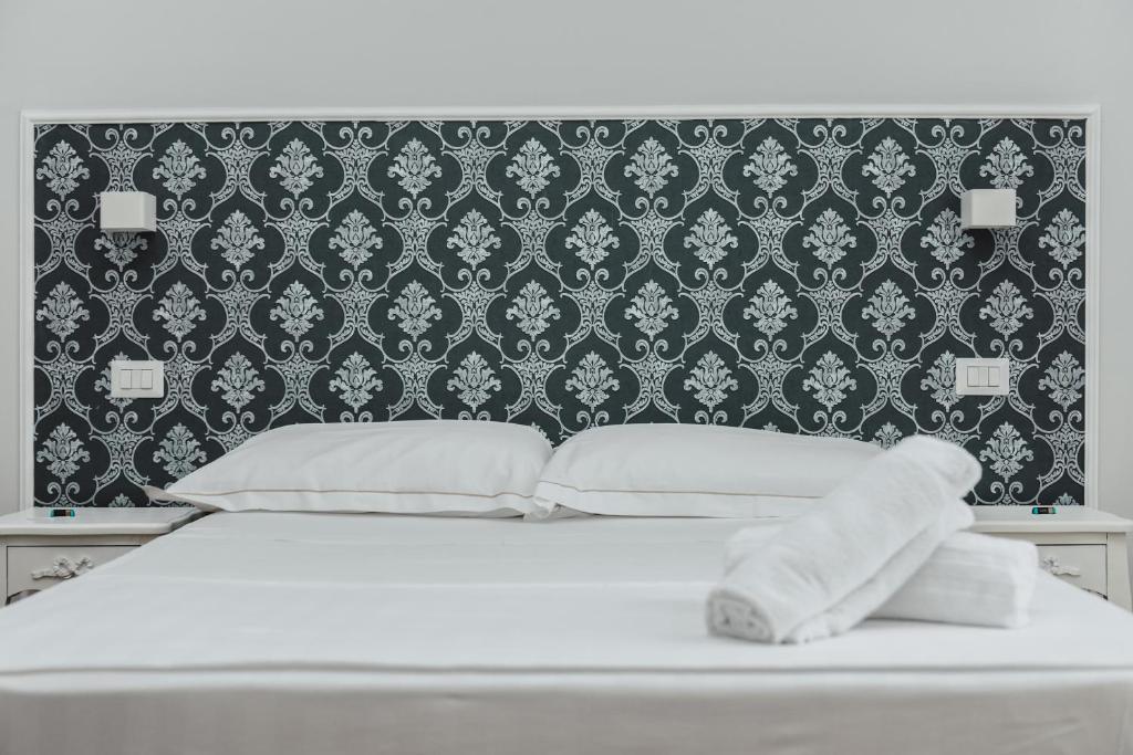 Posteľ alebo postele v izbe v ubytovaní Elysium B&B