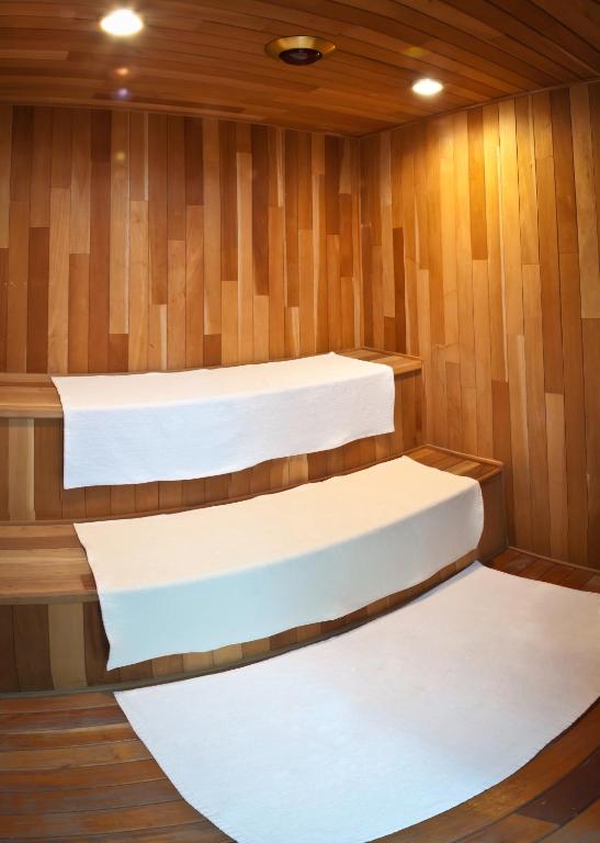 Postel nebo postele na pokoji v ubytování Hotel Malibu