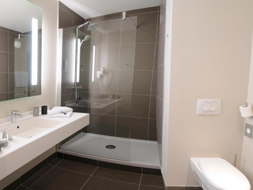 Koupelna v ubytování Best Western Plus Hôtel & Spa de Chassieu
