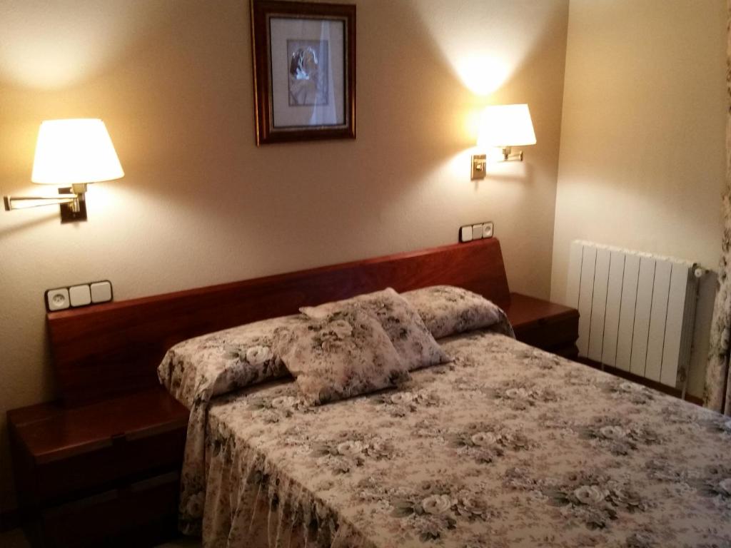 Postel nebo postele na pokoji v ubytování Villa Fabiola
