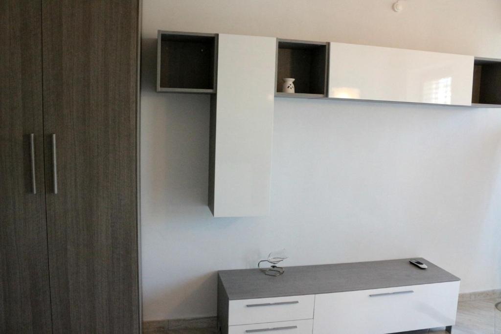 Kuchyň nebo kuchyňský kout v ubytování Paradeisos Residence Sas
