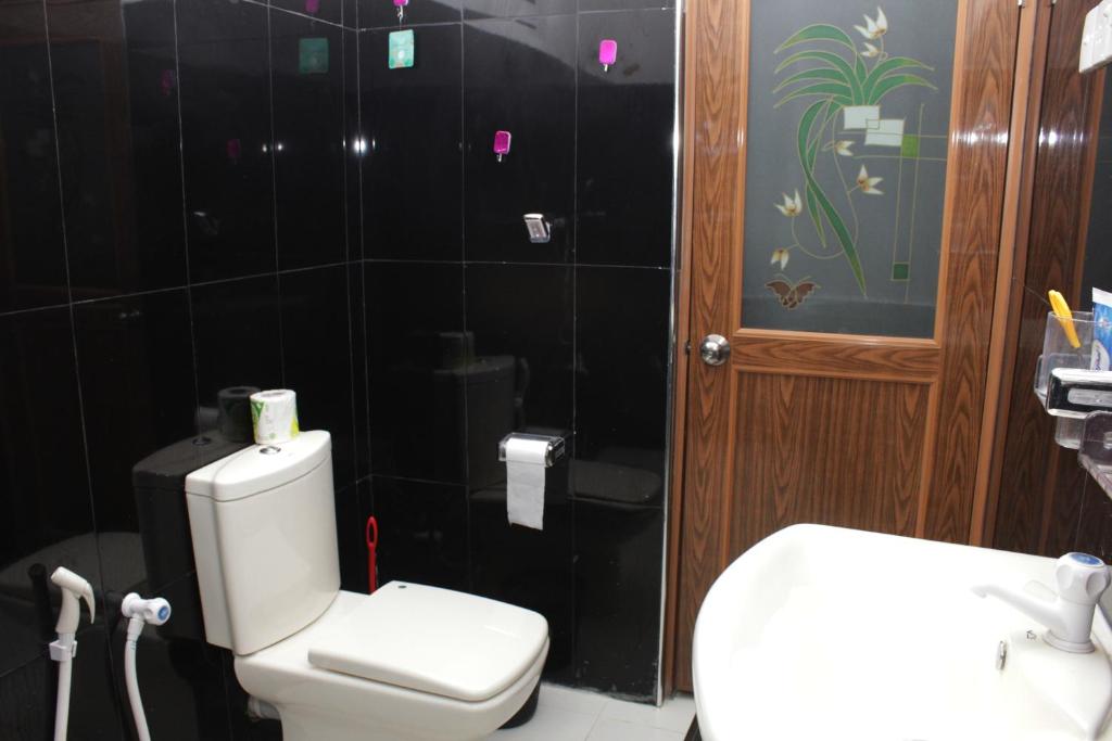 Koupelna v ubytování Asiri HomeStay