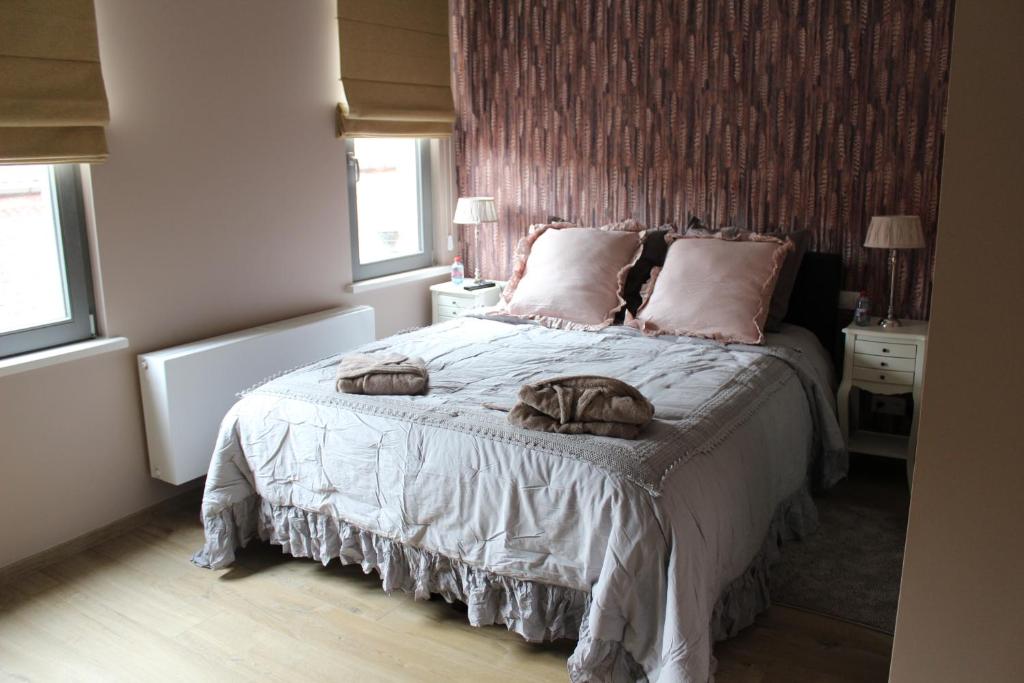 Postel nebo postele na pokoji v ubytování B&B Heart Of Bruges