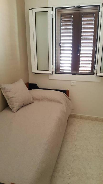 Postel nebo postele na pokoji v ubytování Apartamento a 150 metros de la playa en la Fosca