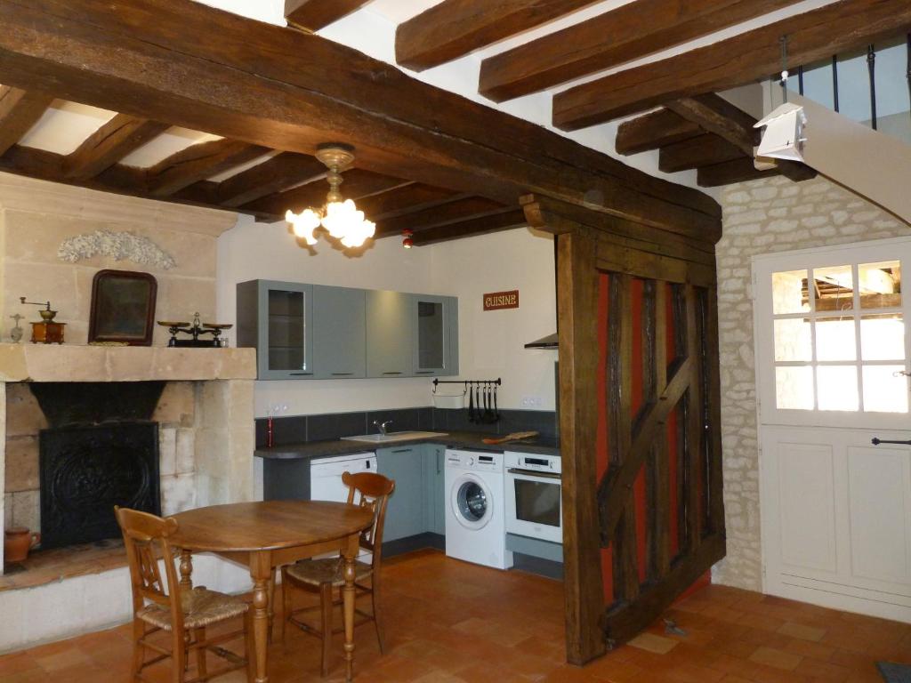 Η κουζίνα ή μικρή κουζίνα στο Le Petit Gite De La Promenade