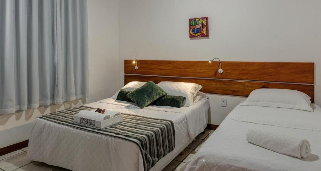 Postel nebo postele na pokoji v ubytování Pousada Lua e Mar