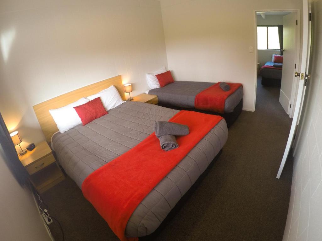Letto o letti in una camera di Mt Aspiring Holiday Park