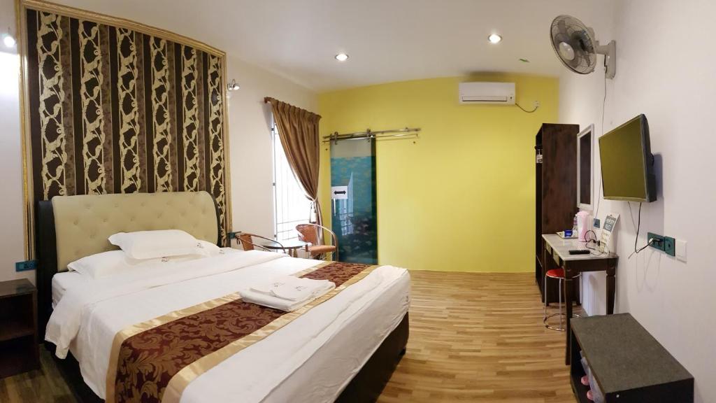 Postel nebo postele na pokoji v ubytování Pilly Homestay