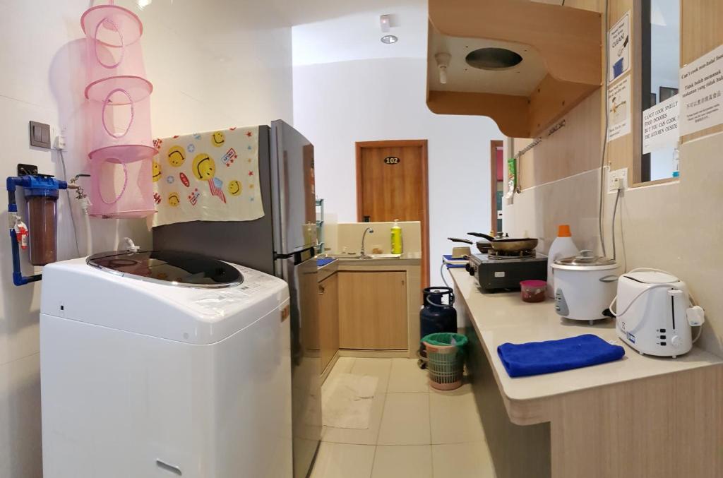 Kuchyň nebo kuchyňský kout v ubytování Pilly Homestay