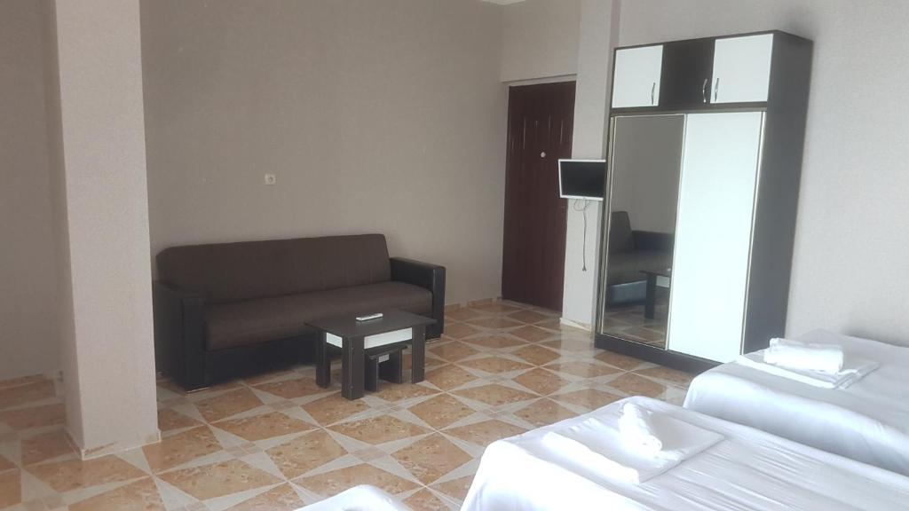Postel nebo postele na pokoji v ubytování Hotel Kvariati Nugo