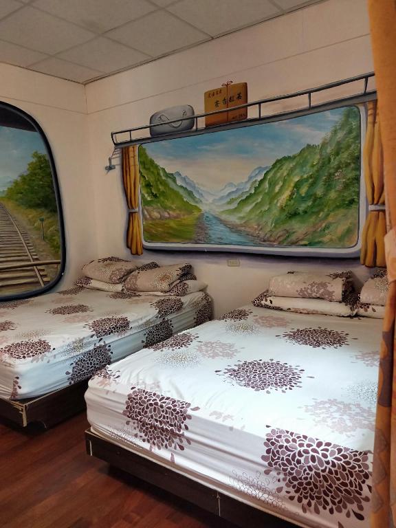 Postel nebo postele na pokoji v ubytování Signal B&B 信號咖ㄟ厝 民宿
