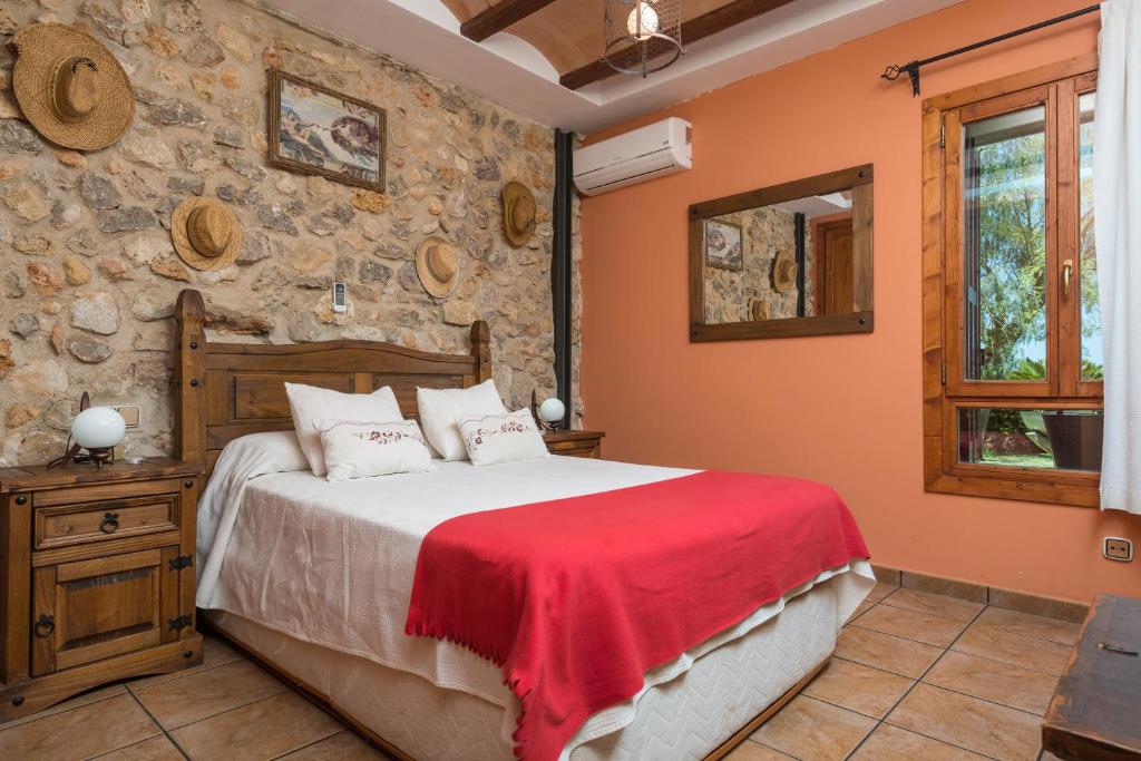 A bed or beds in a room at Finca Can Diego