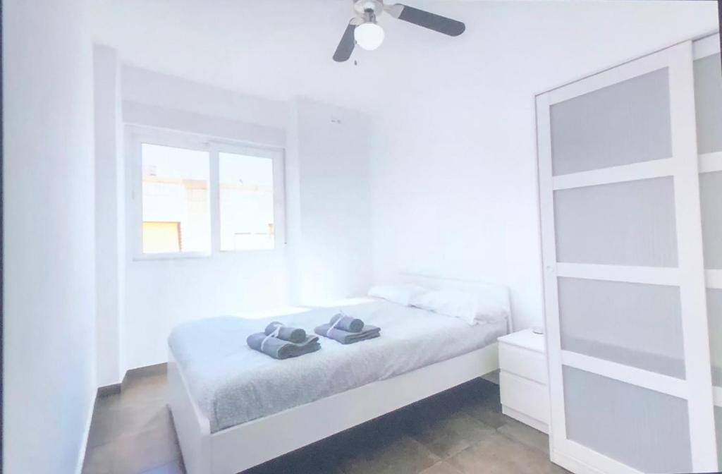 Posteľ alebo postele v izbe v ubytovaní lovely apartament Alicante