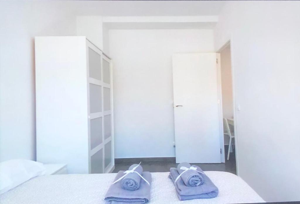 Posteľ alebo postele v izbe v ubytovaní lovely apartament Alicante