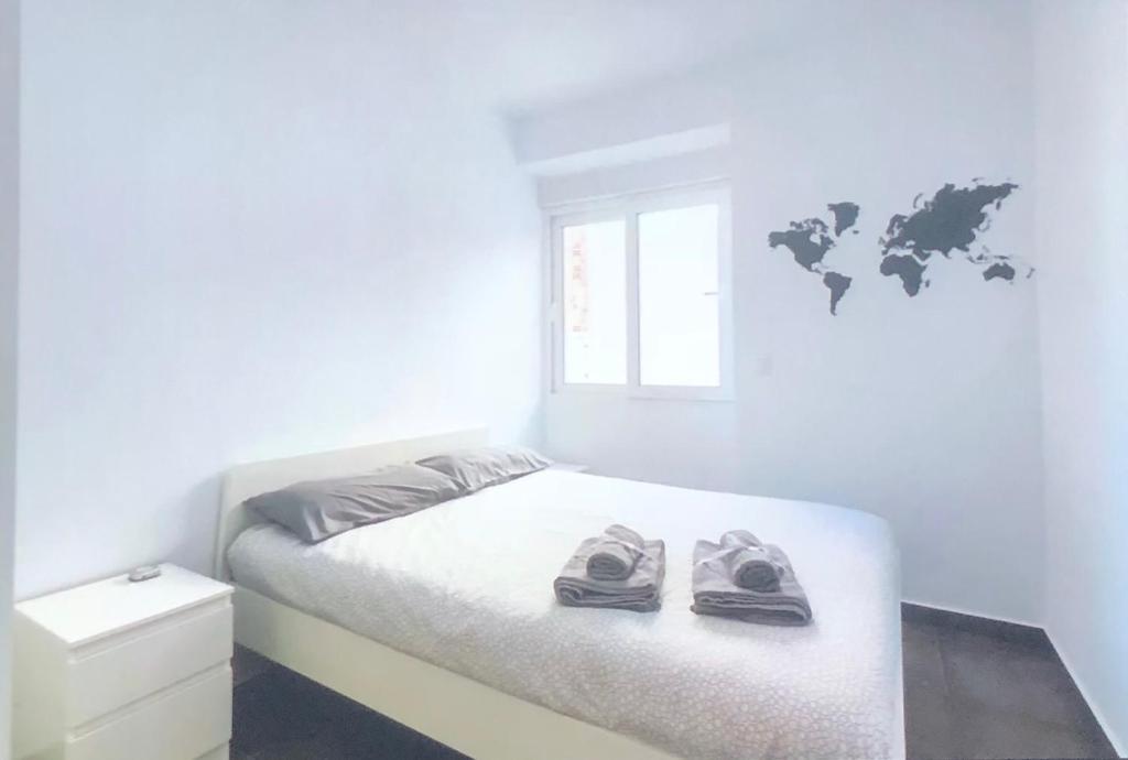 Posteľ alebo postele v izbe v ubytovaní lovely apartament Alicante