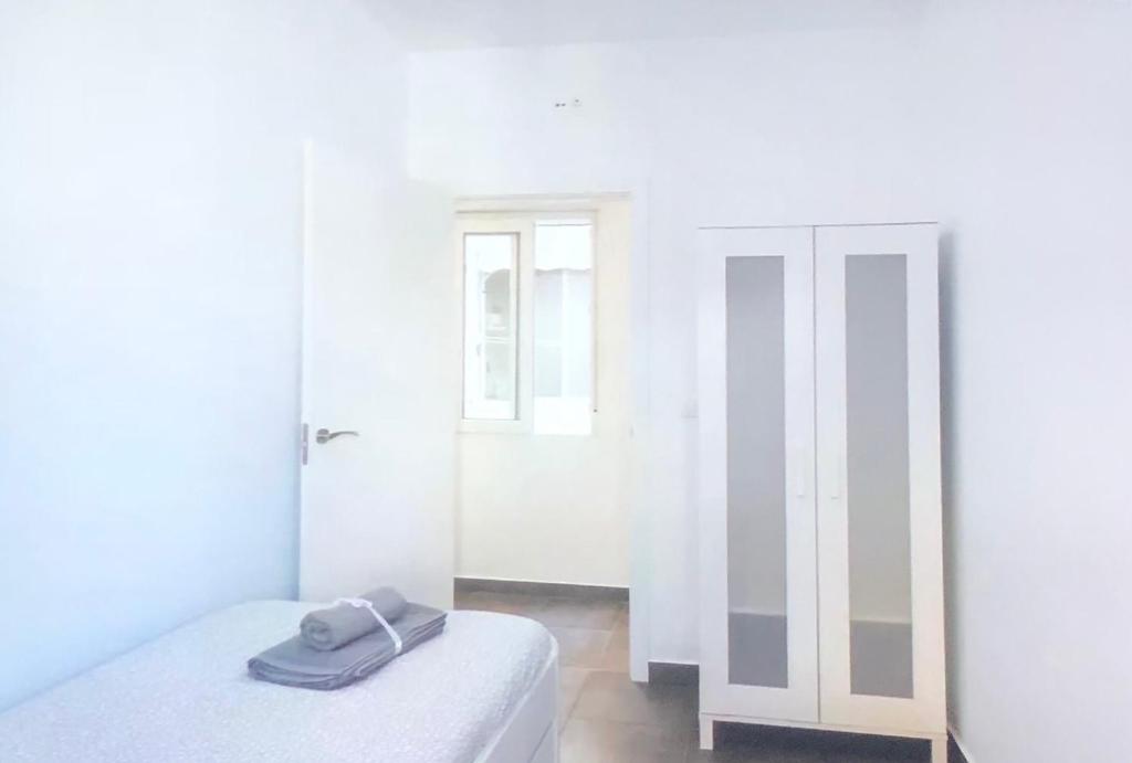 Posteľ alebo postele v izbe v ubytovaní lovely apartament Alicante