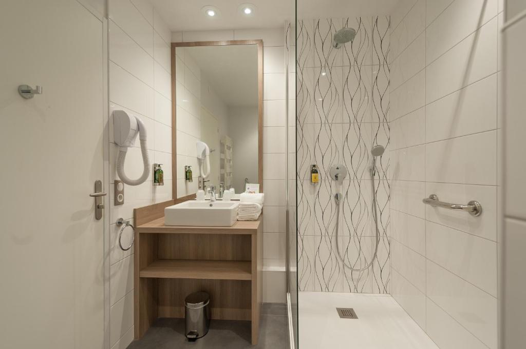 Koupelna v ubytování Hotel & Spa Radiana